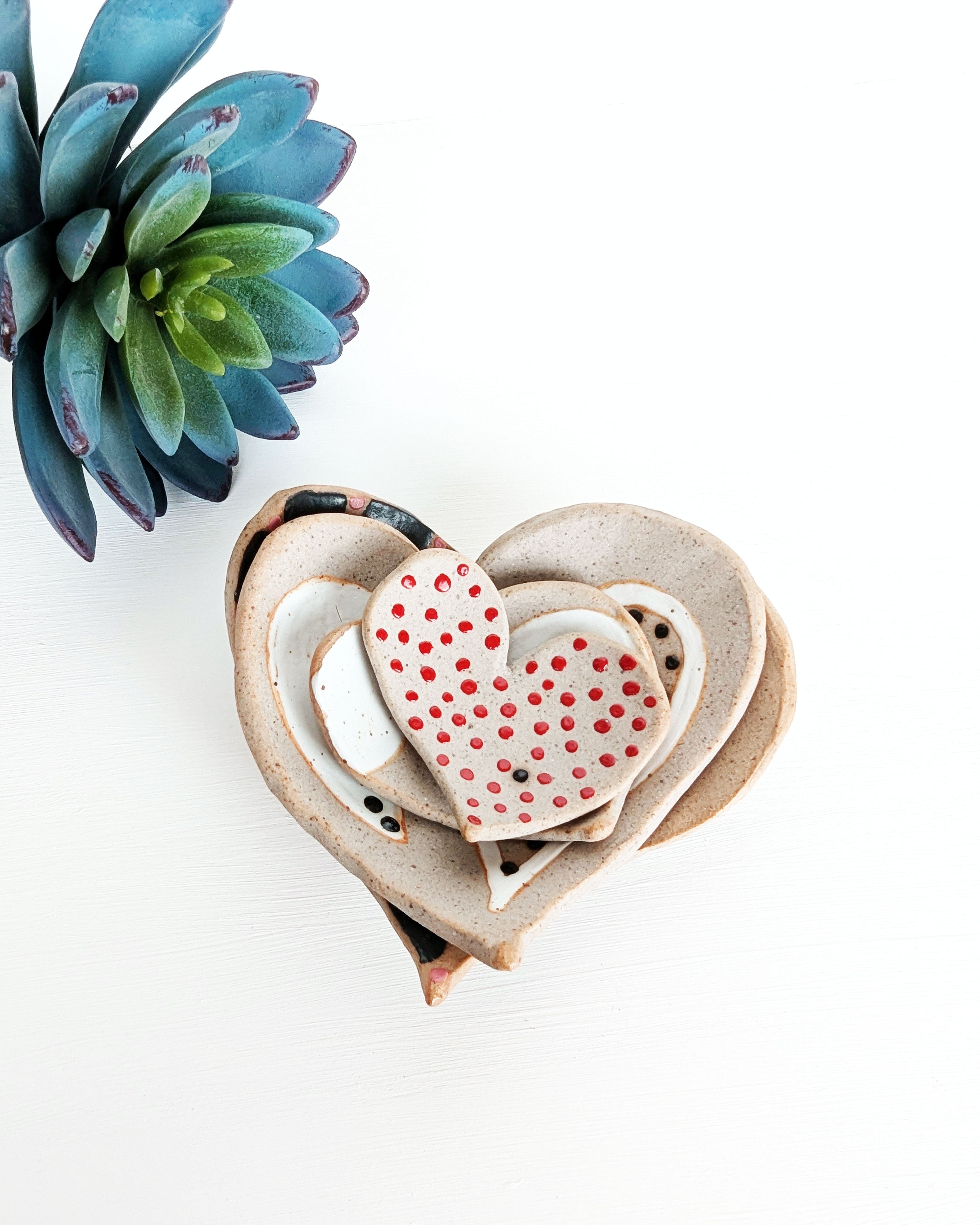 One-of-a-kind handmade stoneware heart trinket dishes that nest together, perfect for holding rings, jewelry, crystals, and tiny treasures.