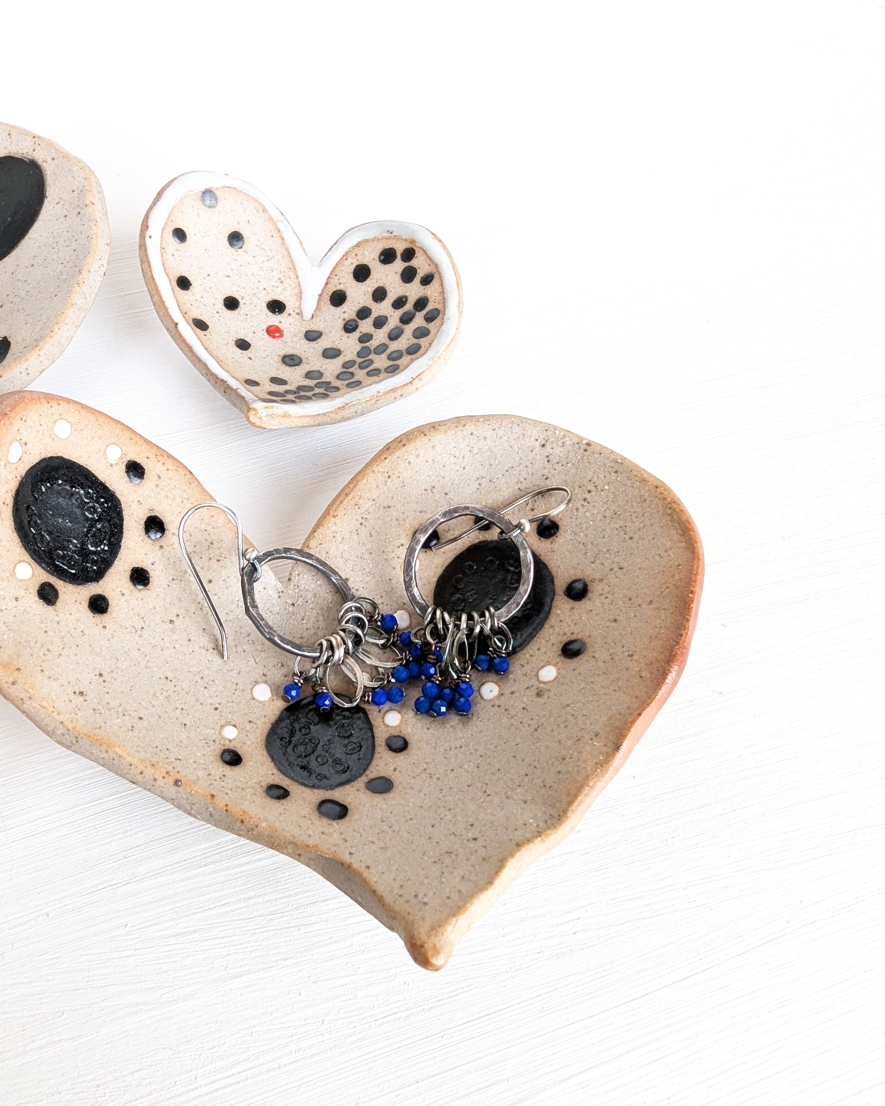 One-of-a-kind handmade pottery heart dishes for vanities, nightstands, and home décor.