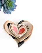 Hand-painted pottery heart dishes handmade in Colorado from speckled stoneware clay.