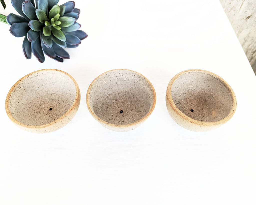 One-of-a-kind artisan stoneware jewelry bowls inspired by the desert and handcrafted in Colorado.