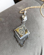Boho fossil jewelry pendant with pyrite bail and metallic sparkle shown on chain (not included)