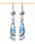 Blue sapphire and plume agate dangle earrings in sterling silver nge in bright light
