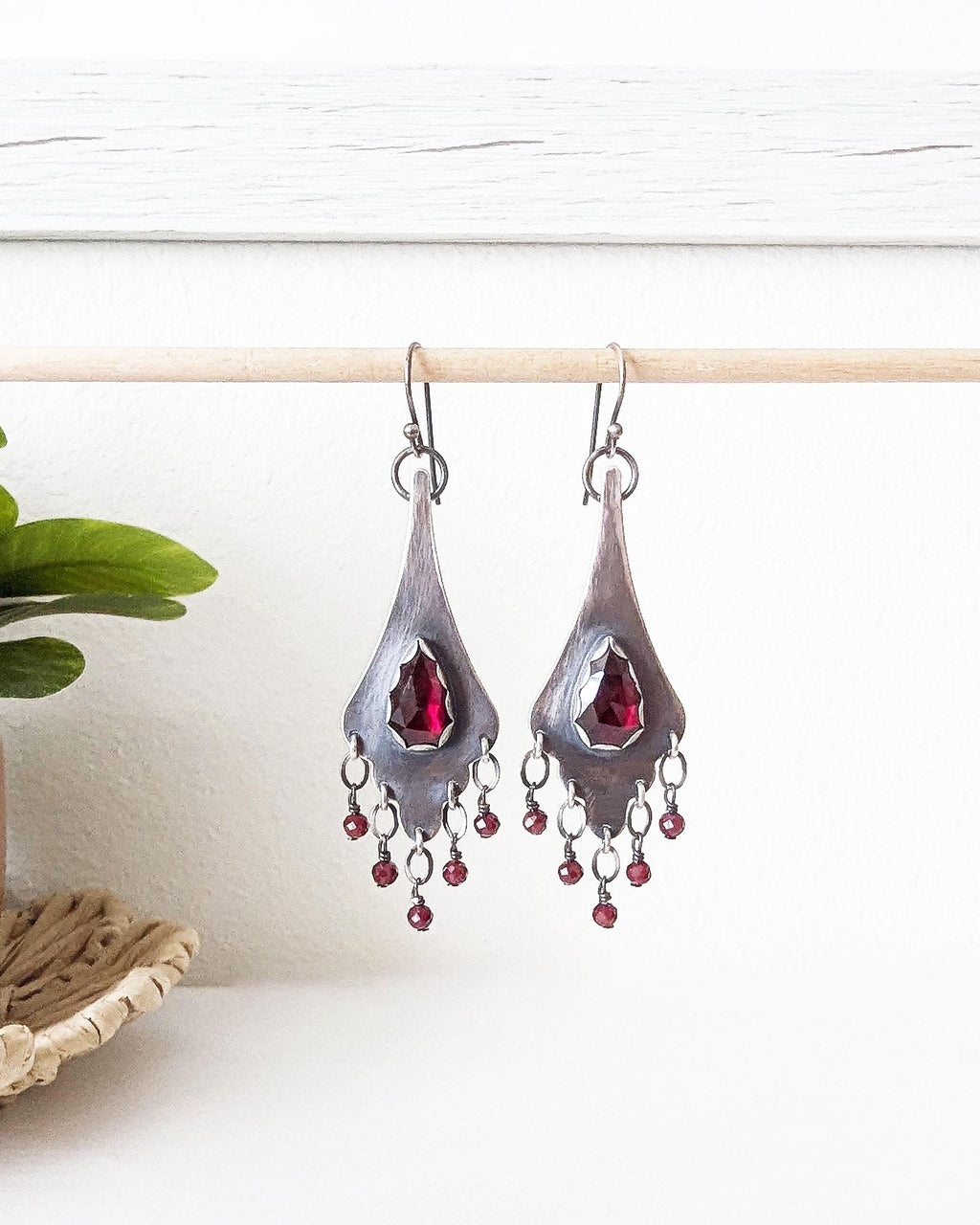 Romantic deep red garnet statement earrings with celestial elegance