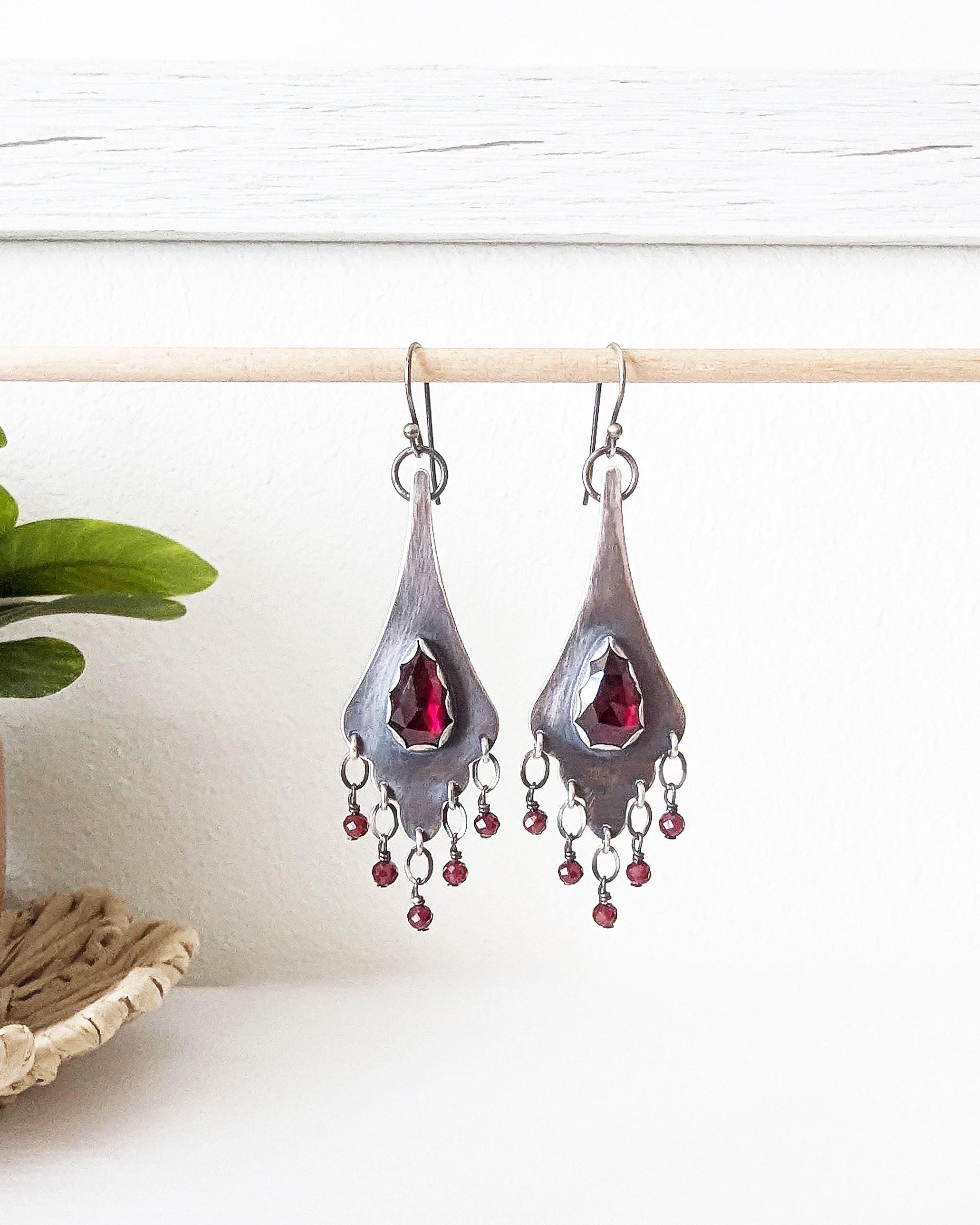 Romantic deep red garnet statement earrings with celestial elegance
