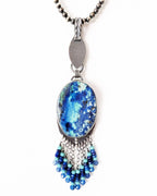 Oval bluebird azurite gemstone with aqua and cobalt swirling patterns on chain (not included)