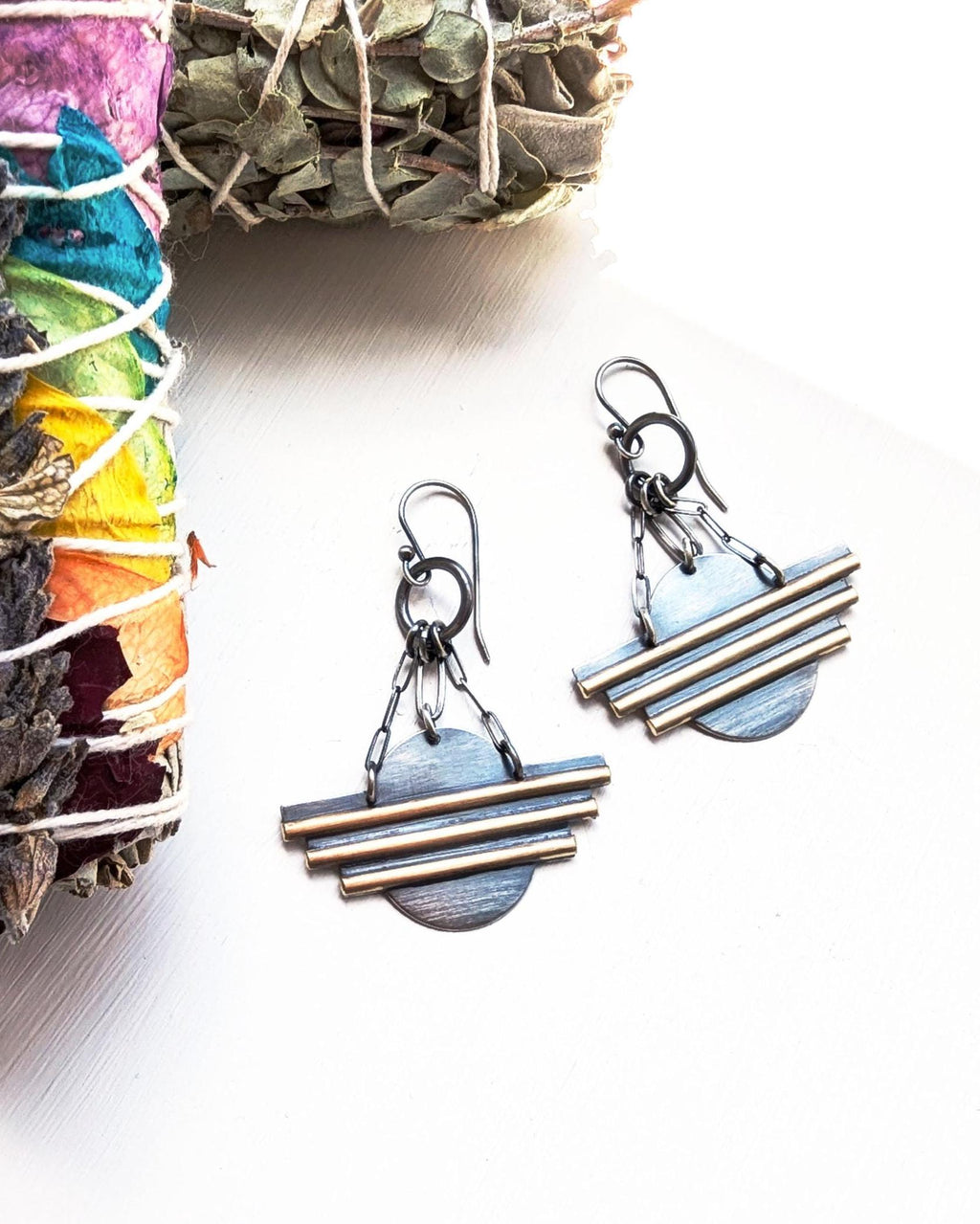 Southwestern mixed metal earrings in sterling silver and brass