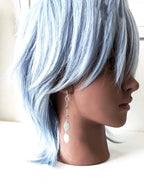 Versatile sterling silver drop earrings for casual or dressy looks on mannequin for scale