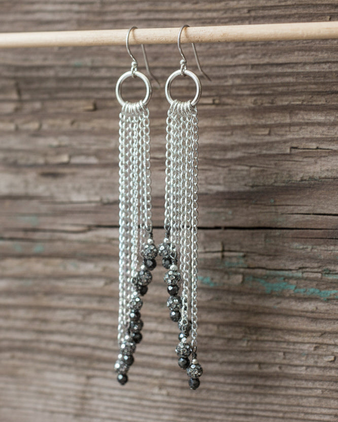 Asymmetrical diamond-polished chain earrings with pave rhinestones