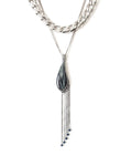 Necklace with a leaf-shaped pendant and chain on a white background