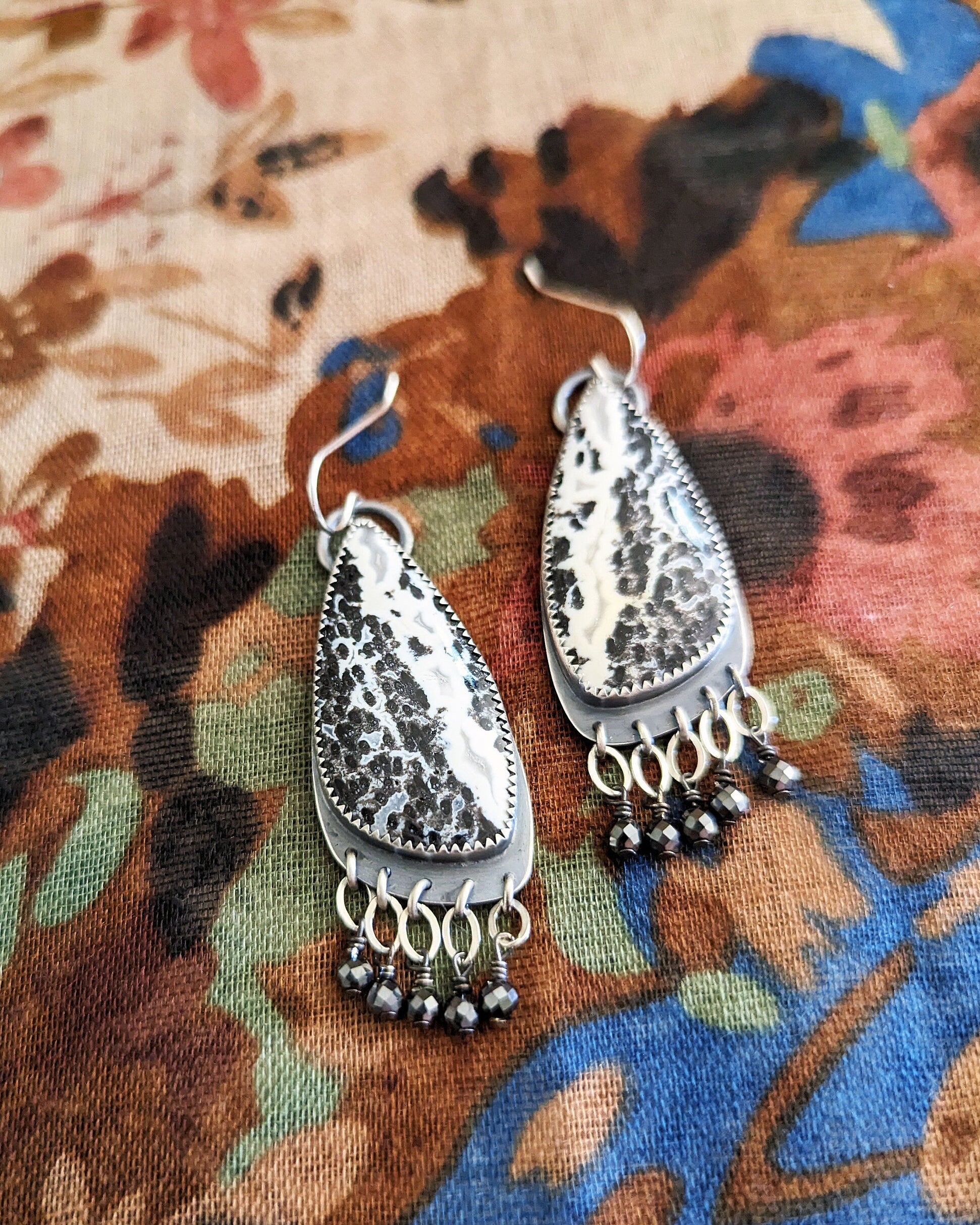 Artisan handmade palm root agate earrings with organic spotted patterns