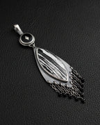 White moonstone and black spinel bead fringe detail
