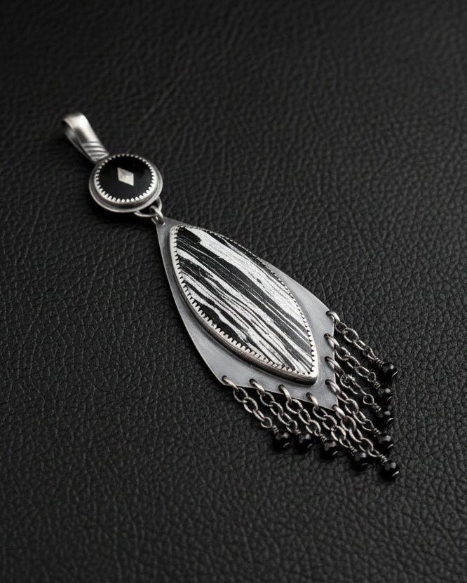 White moonstone and black spinel bead fringe detail