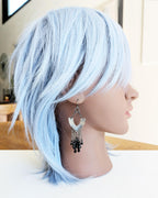 Handcrafted black chandelier earrings worn for scale on mannequin

