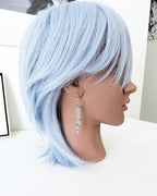 Lightweight artisan earrings with labradorite beads and swaying chain fringe on a mannequin for scale