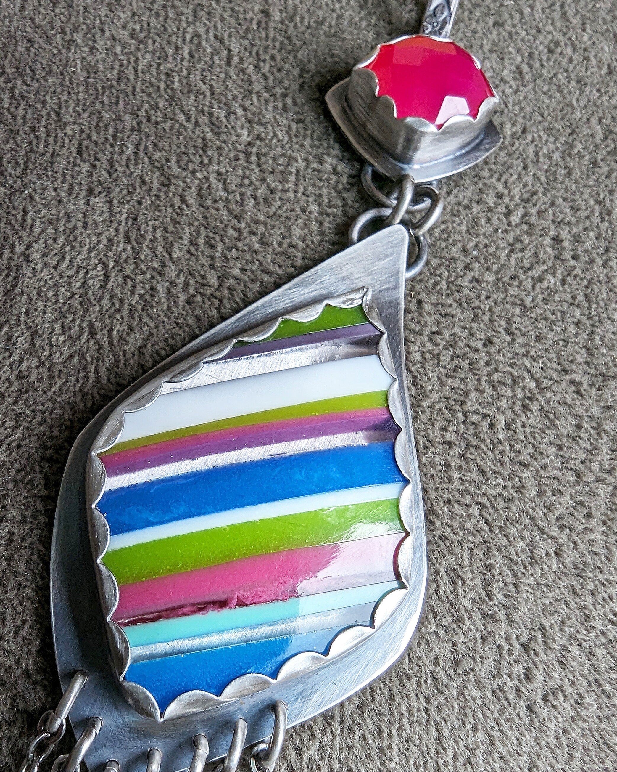 Close up of surfite an chalcedony pendant