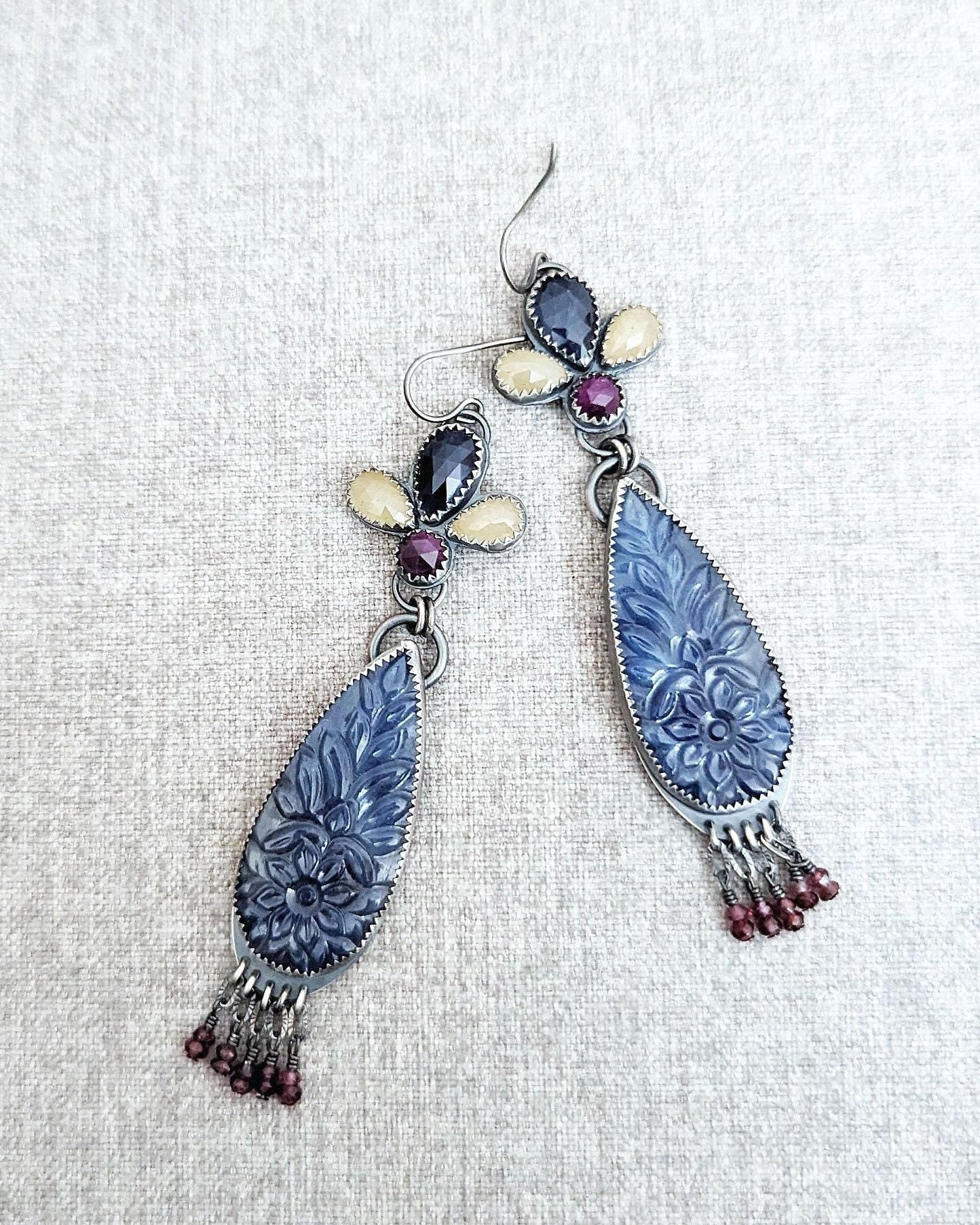 Purple sapphire bead fringe with regal movement
