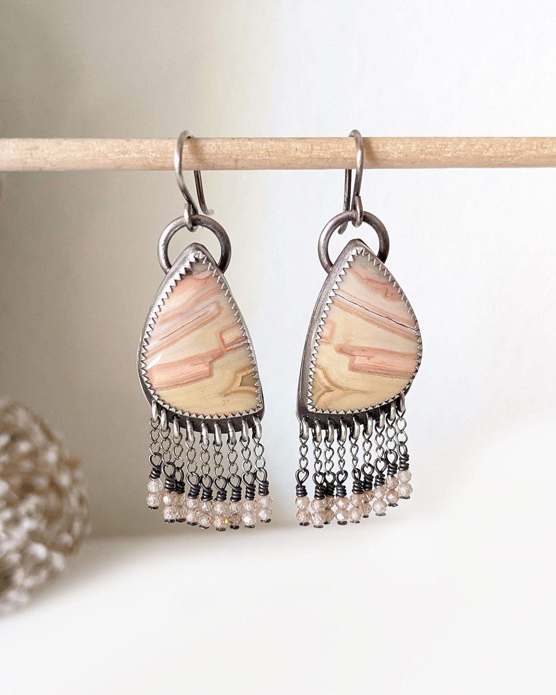 Banded agate earrings with peach zircon bead fringe in oxidized sterling silver