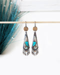 Turquoise colored opalized wood earrings in oxidized sterling silver with smoky quartz fringe