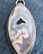 Close-up of marquis-shaped Turkish flower agate showing natural druzy sparkle
