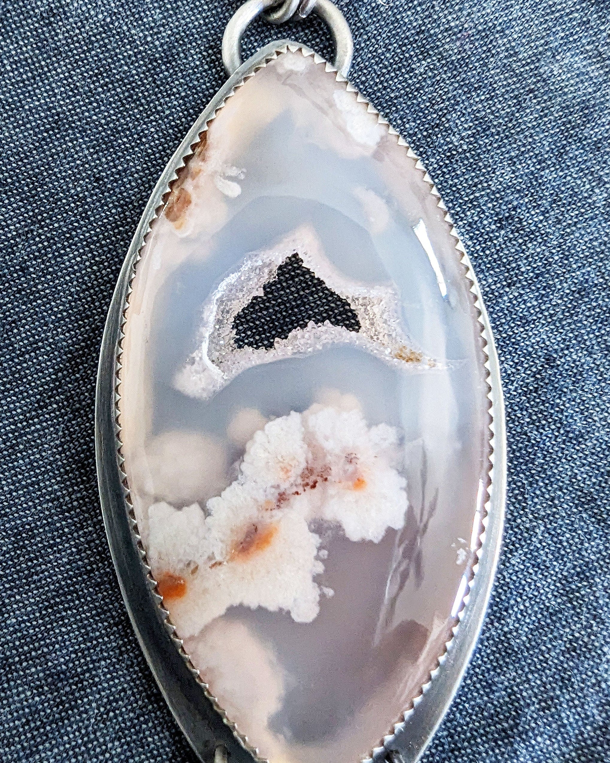Close-up of marquis-shaped Turkish flower agate showing natural druzy sparkle
