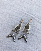 Oxidized sterling silver earrings with septarian fossil, CZ, black spinel, and triangular fringe
