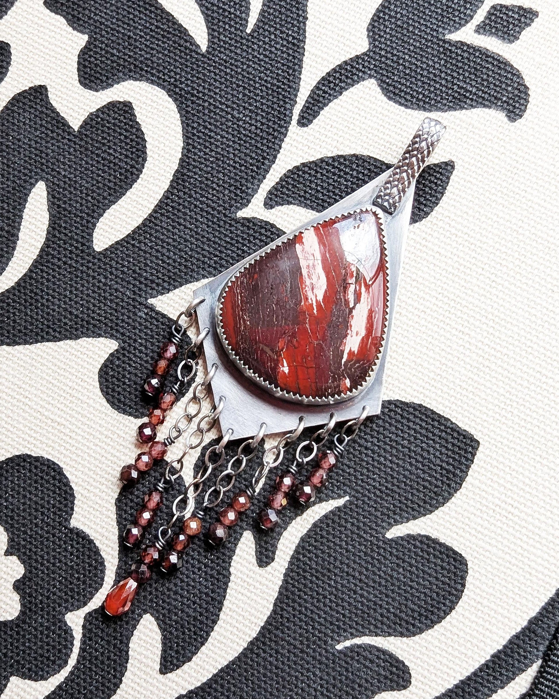 Snakeskin jasper pendant with glittering garnet bead fringe