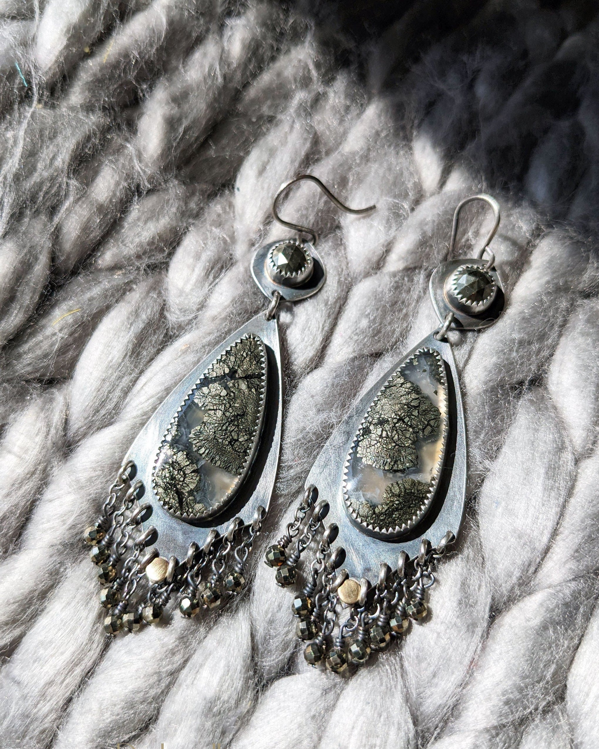 Statement fringe earrings featuring pear shaped agate with marcasite inclusions