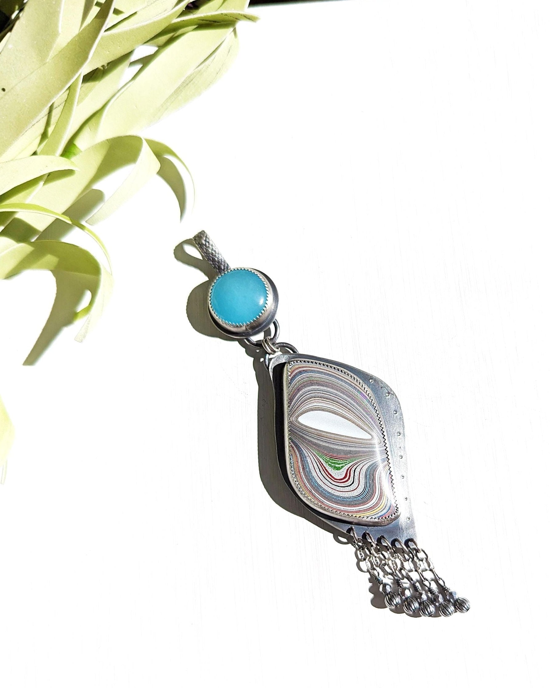 Blue chalcedony and Fordite double-stone pendant in oxidized sterling silver