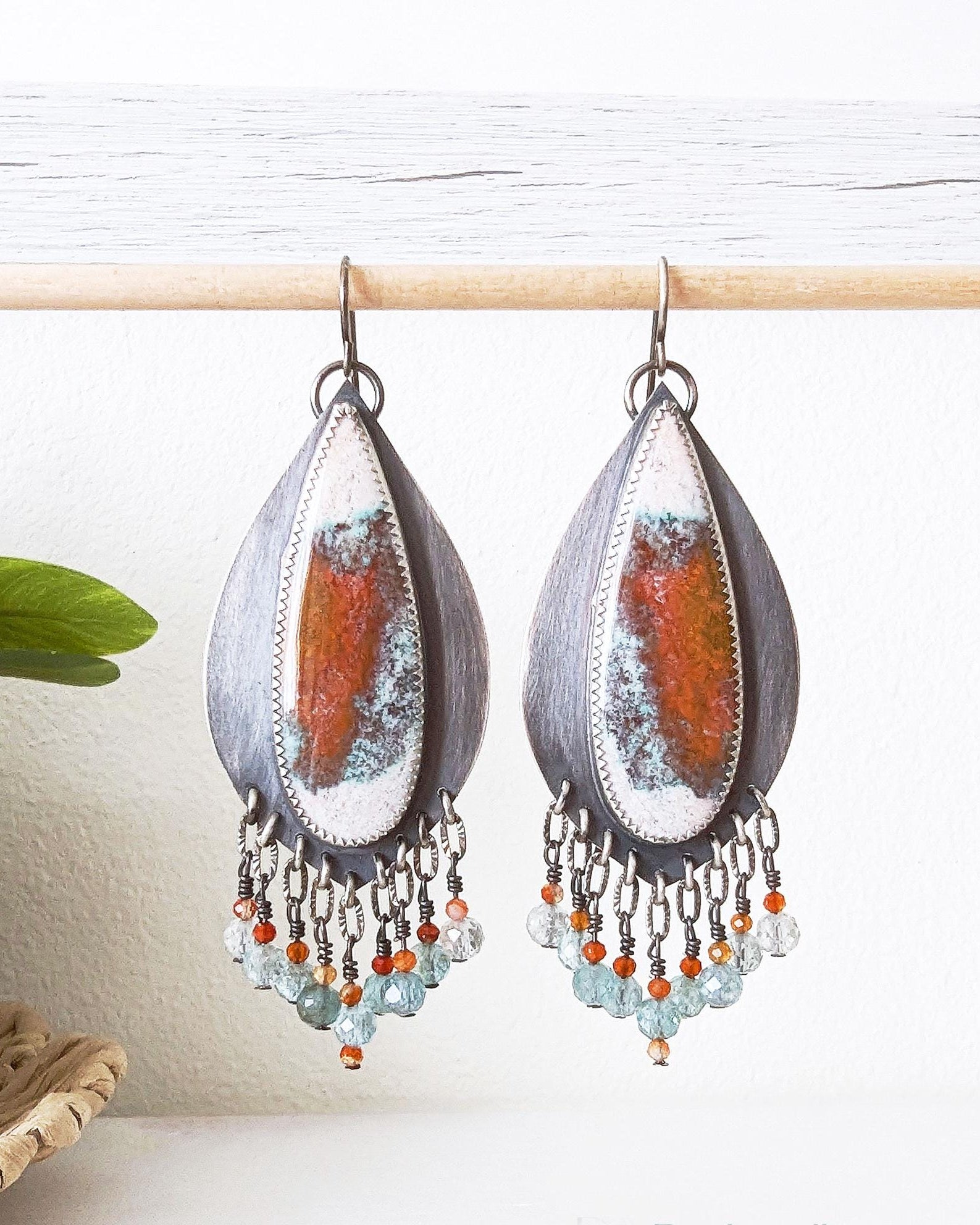 Artisan sterling silver earrings with sunset-inspired color palette