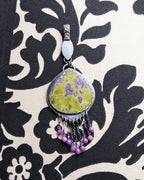 Atlantisite teardrop pendant with chartreuse and lilac pattern