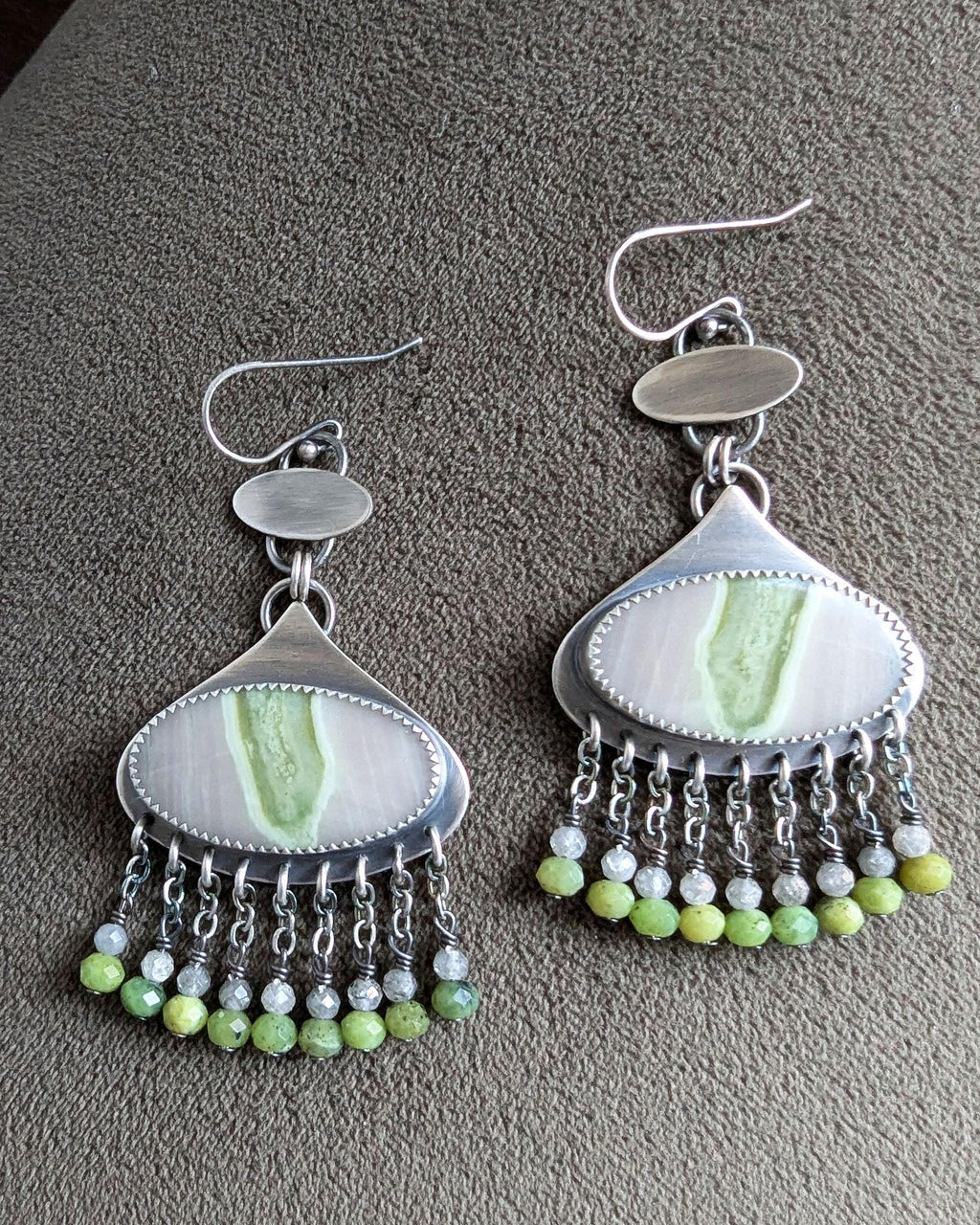Earthy yet vibrant sterling silver earrings with green stones