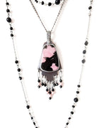 Rhodonite pendant with pink and black pattern in oxidized sterling silver shown on chain with layering necklace (not included)
