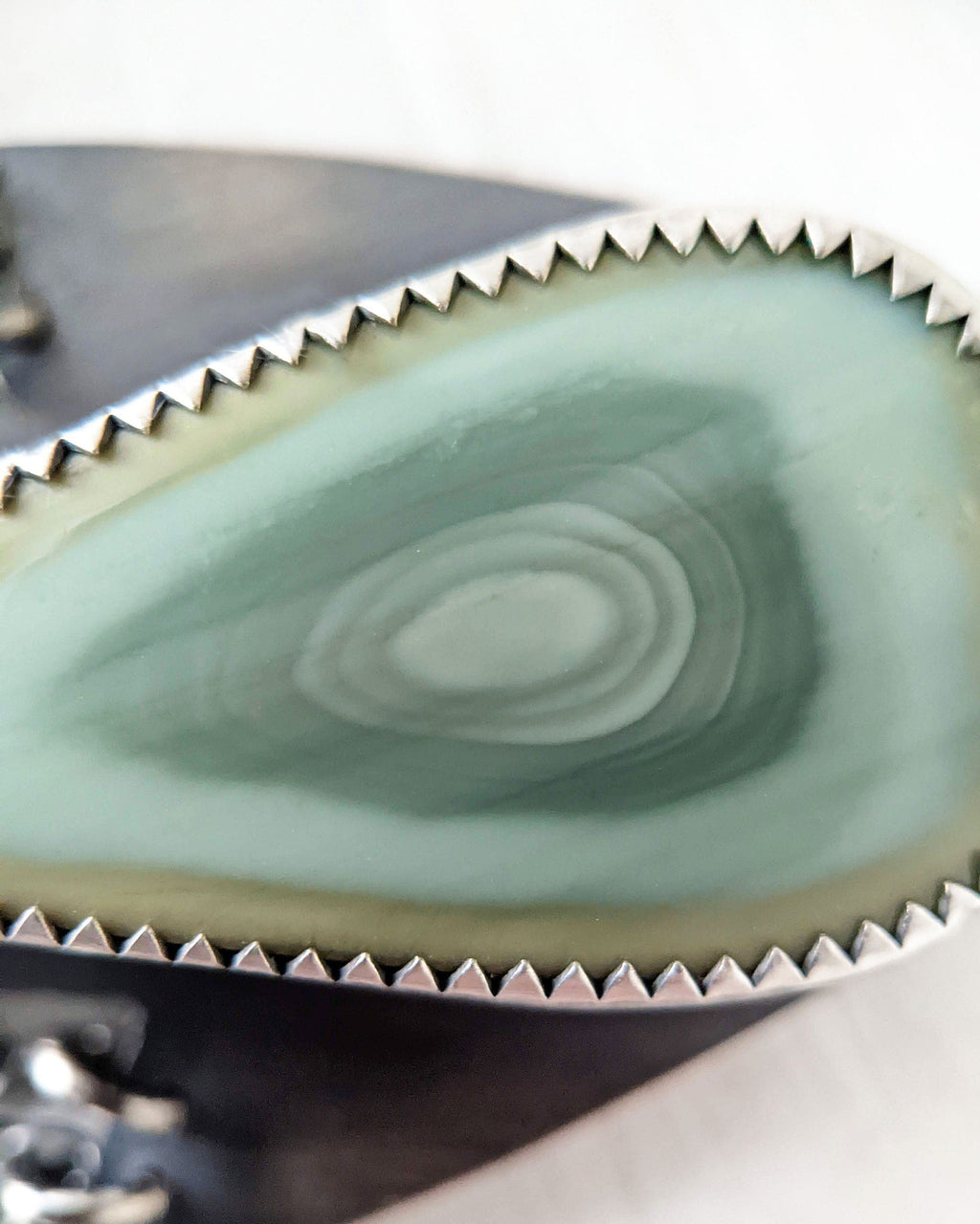 Close up of main stone imperial jasper set in a bezel setting