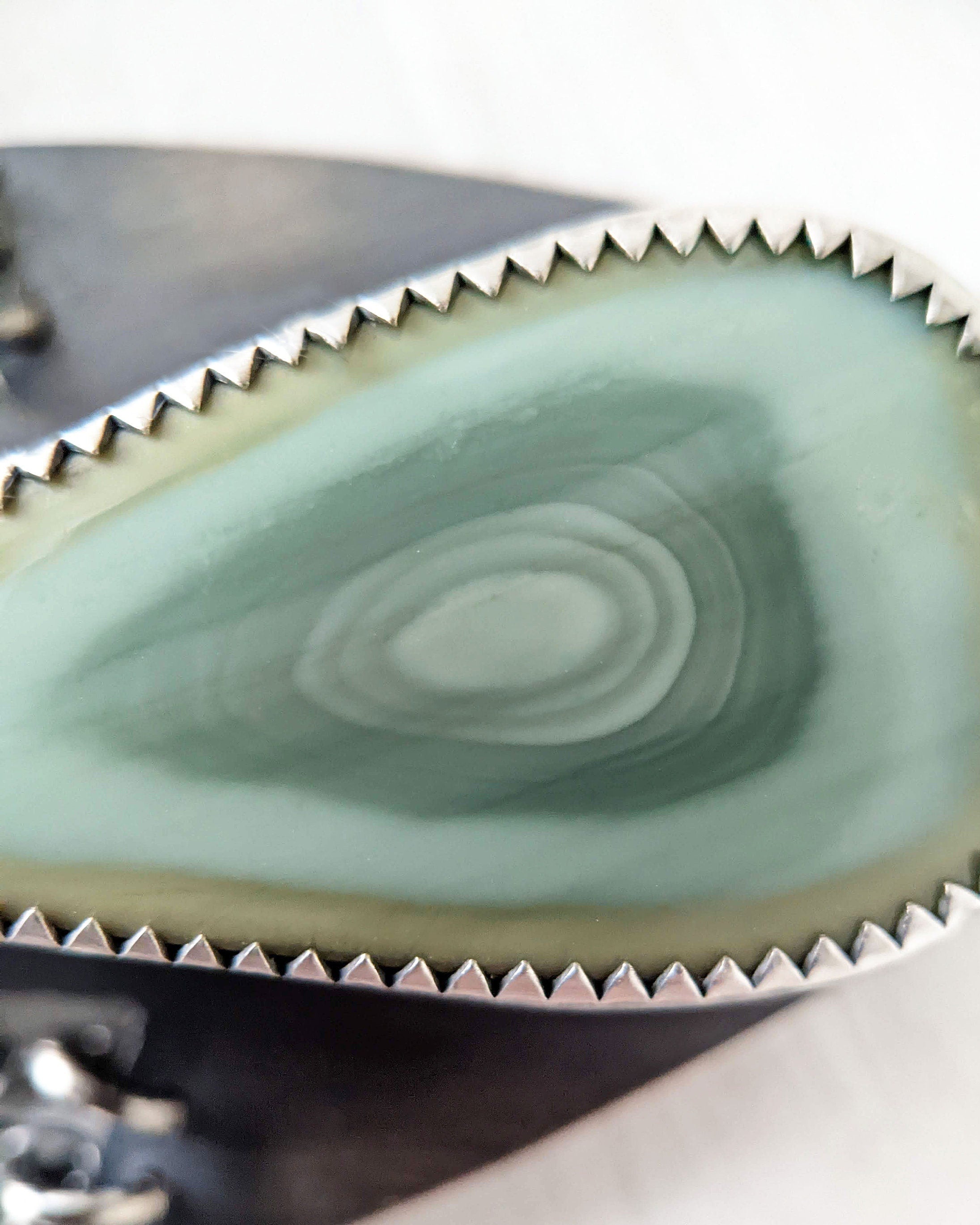 Close up of main stone imperial jasper set in a bezel setting