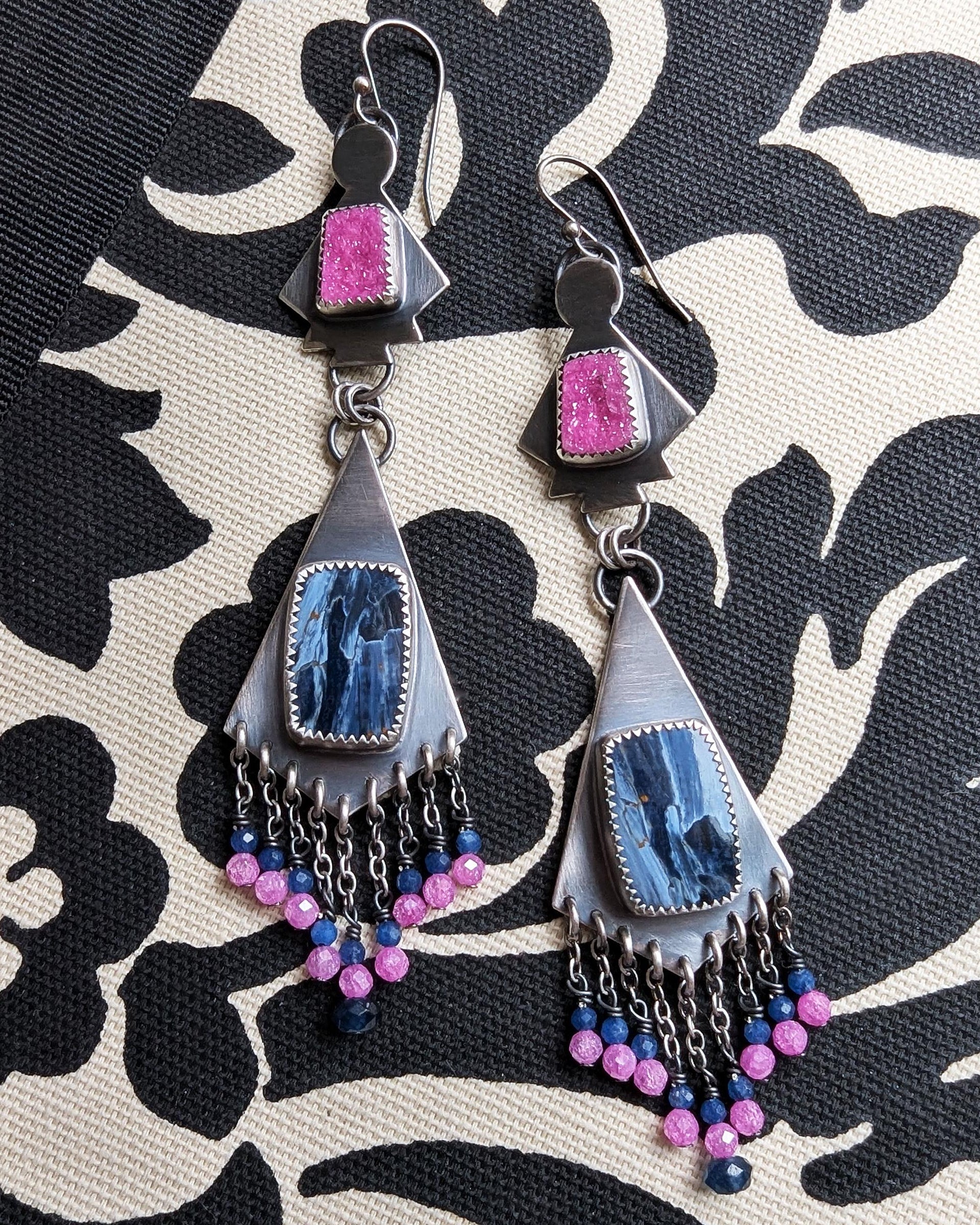 Blue jade and pink CZ bead accents beneath bold gemstones