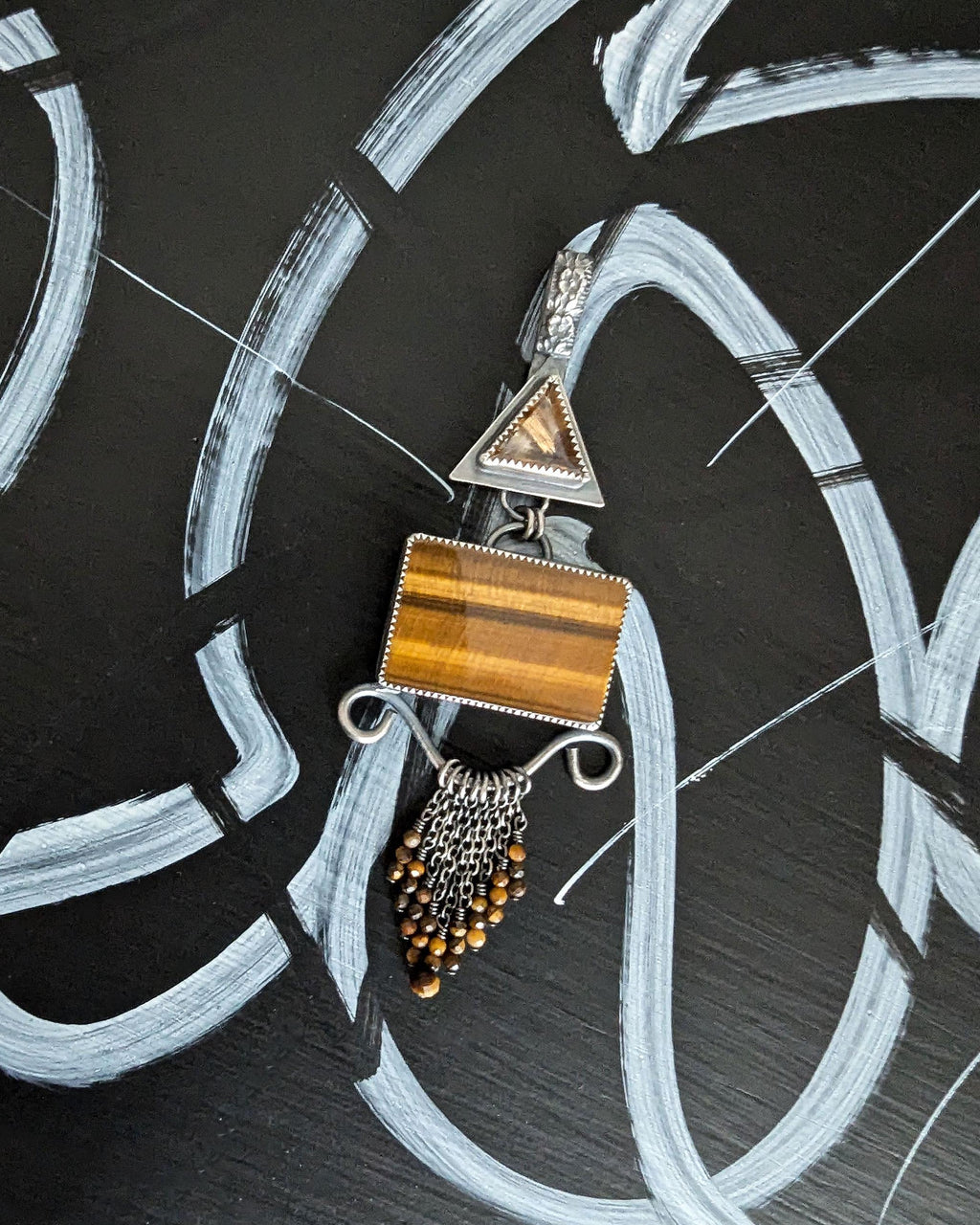 Earthy boho chic pendant featuring tiger’s eye and smoky quartz tones