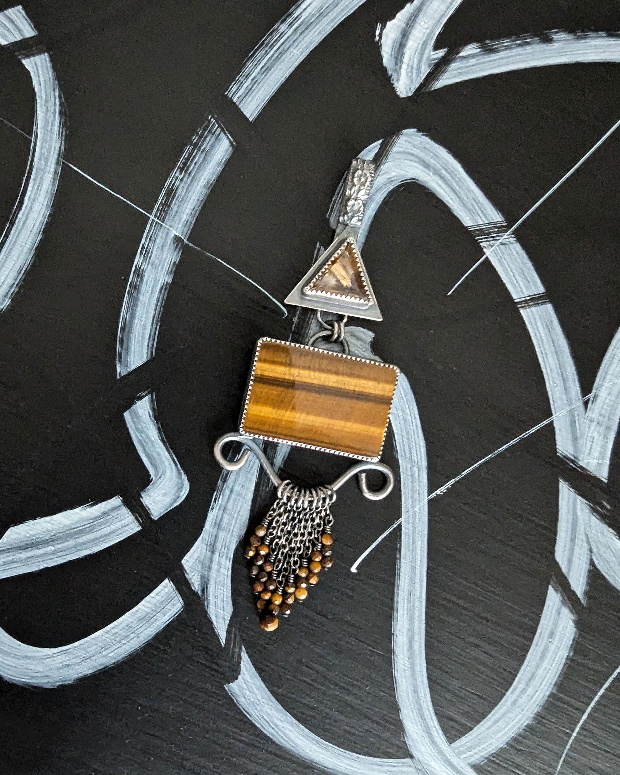 Earthy boho chic pendant featuring tiger’s eye and smoky quartz tones