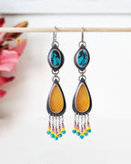 Asymmetrical turquoise leaf and calcite pear dangle earrings