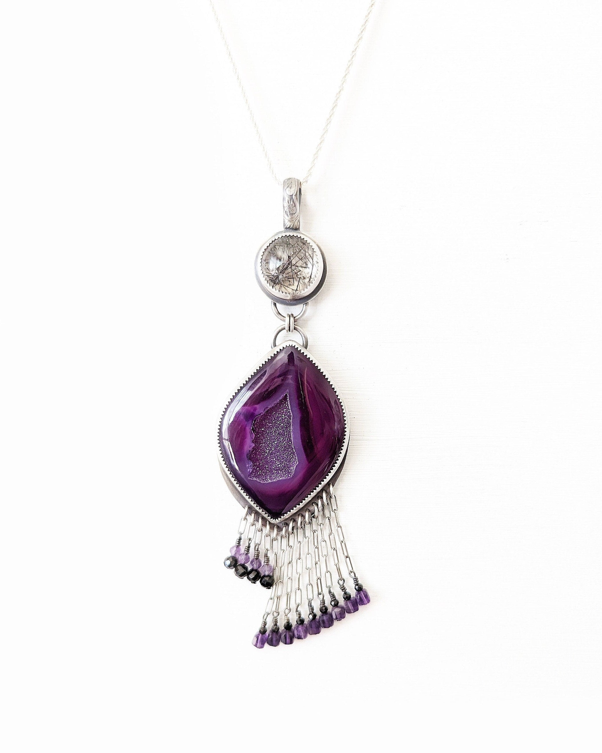 Statement druzy agate pendant with handcrafted silver setting and gemstone fringe