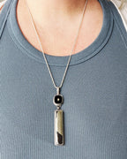Bold oxidized sterling silver necklace with graphic contrast