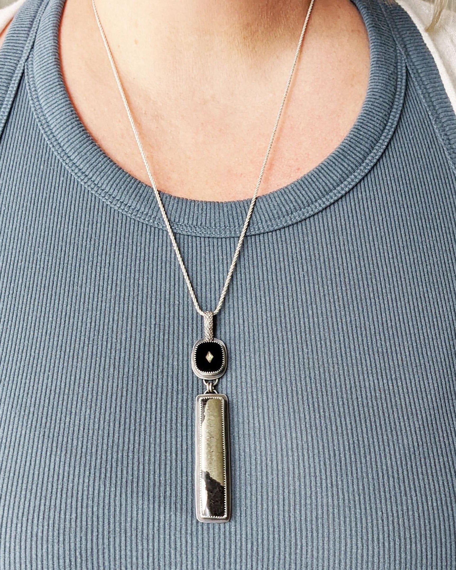 Bold oxidized sterling silver necklace with graphic contrast