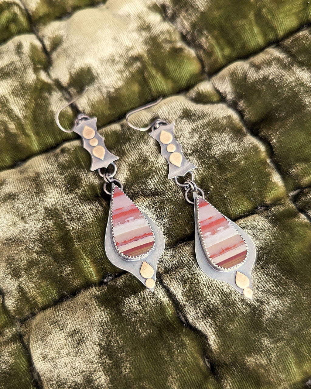 Vintage-inspired artisan earrings featuring natural opalized wood