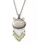Horizontal oval serpentine pendant with lime green vein on chain (not included)
