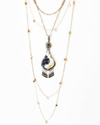 Butter yellow druzy agate pendant with vintage German glass bail shown on chain and with layering necklaces for styling