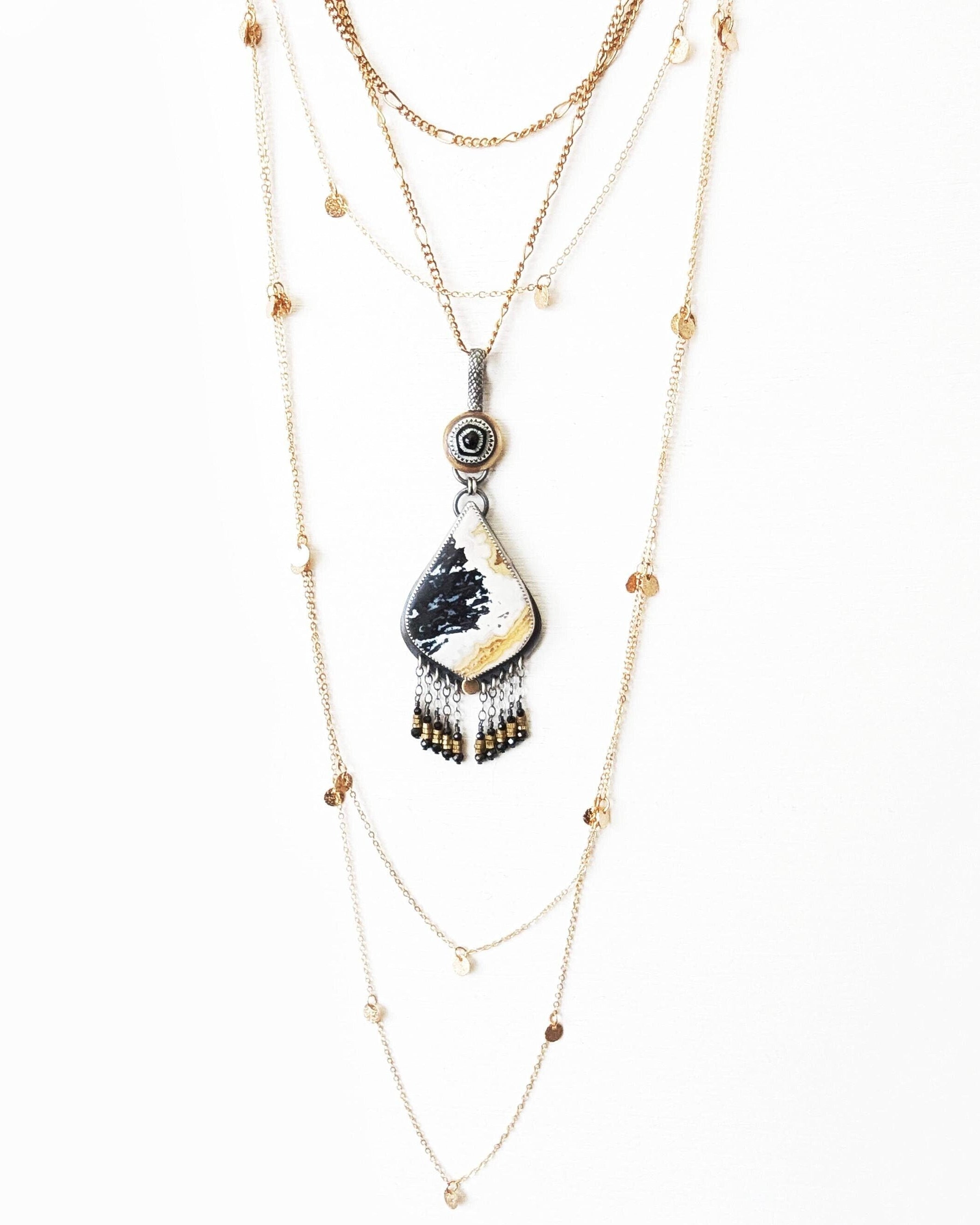 Butter yellow druzy agate pendant with vintage German glass bail shown on chain and with layering necklaces for styling