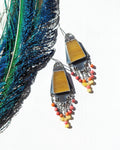 Golden calcite earrings with vibrant coral and yellow jade fringe