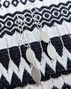 Modern everyday silver earrings with fluid chain movement