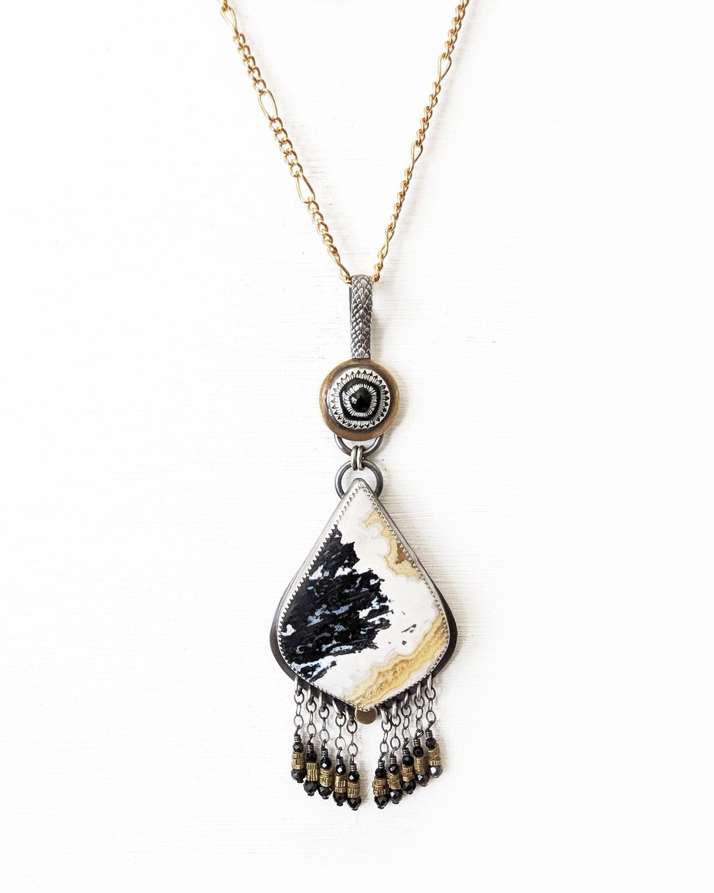 Large mixed metal boho pendant with palm root agate and black spinel shown on chain (not included)