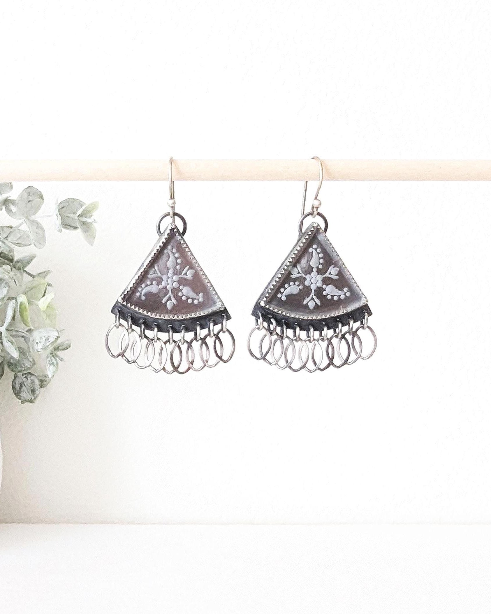 Close-up of floral etched hydro quartz stones in sterling silver triangle earrings
