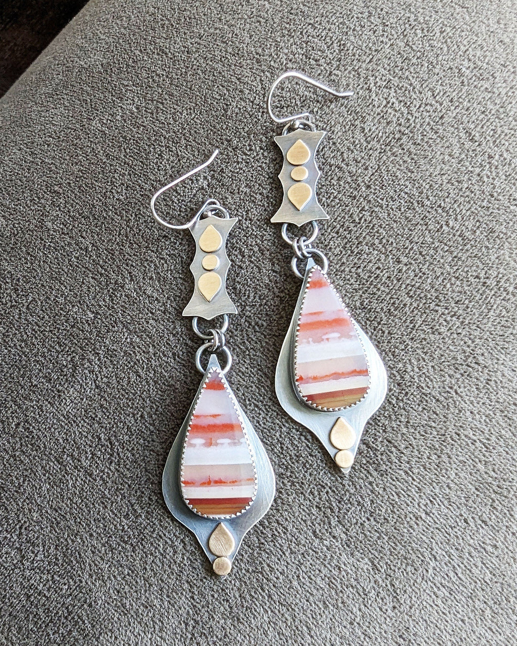 Linear sterling silver drop earrings with hand-cut brass accents